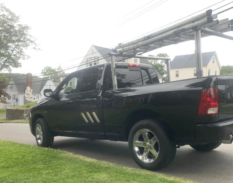 Fleet vehicle cleaning service being performed by Lorain Power Washing in Lorain