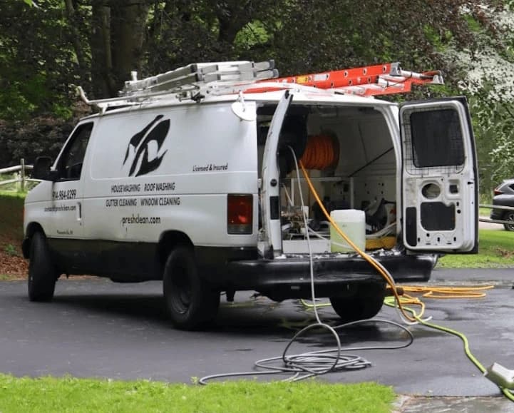 Lorain Power Washing professionals cleaning commercial fleet in Lorain